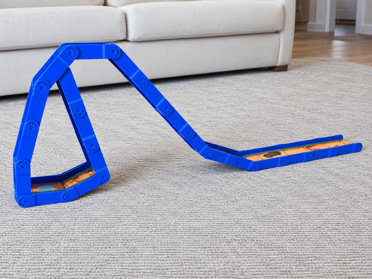 Redi-Rampz track folded into a tall arch with a triangular support on a gray rug